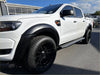 White ford ranger pickup with 6-inch smooth matte black fender flares wheels and side steps for 2016-2018 px2