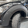 Black matte finish 9-inch bolt style fender flare for mazda bt-50 2012-2020 pickup truck shown from back side