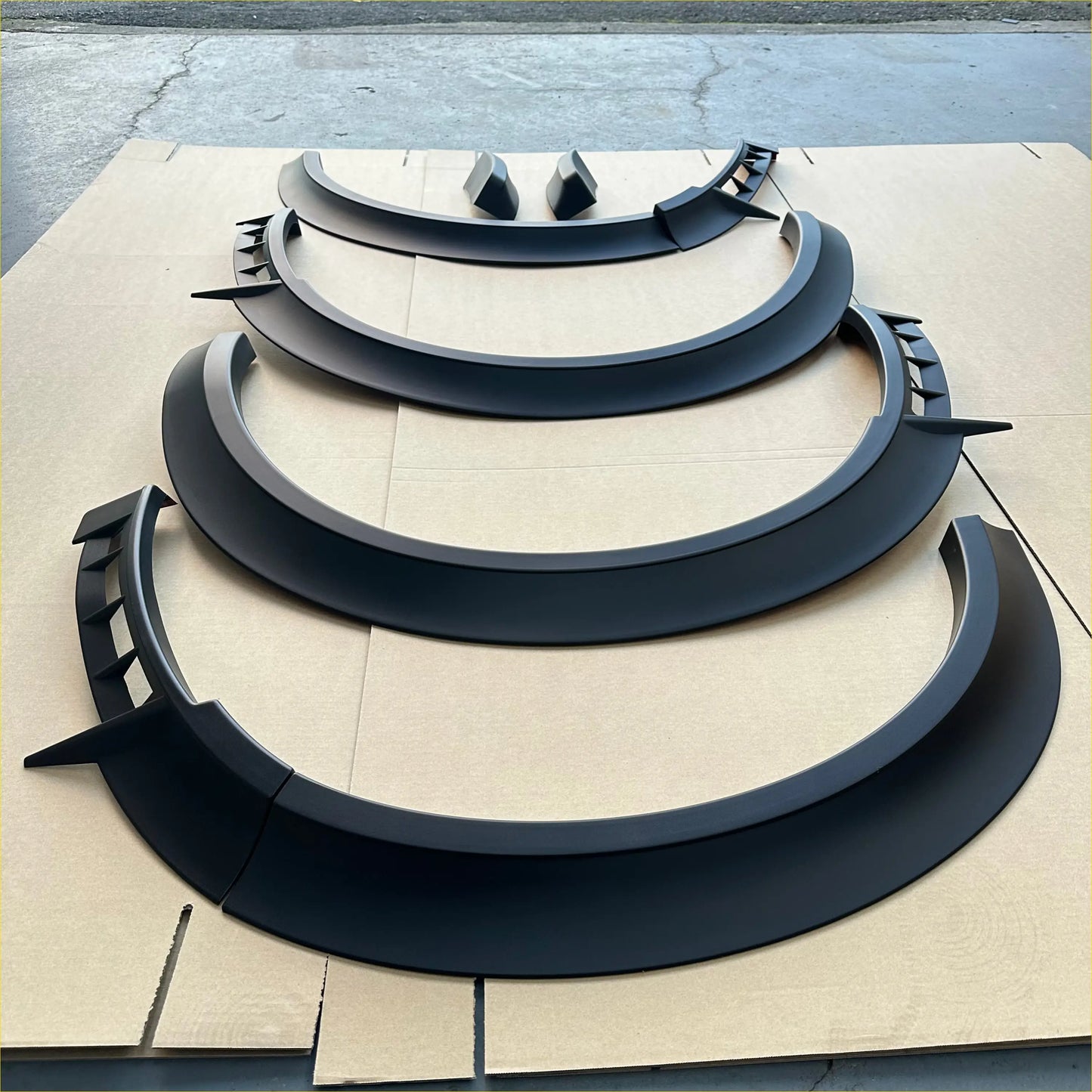 Matte black fender flare for nissan nv350 caravan 2012-current with aggressive angular spike accents sport style