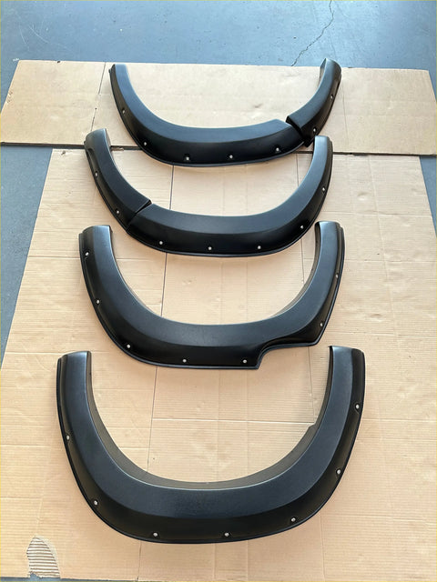 Black plastic fender flares with glossy finish and silver rivets for toyota hilux revo 2015-2017 lychee texture bolt style