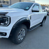 White ford ranger with black matte bolt style fender flares and silver alloy wheels for 2022 new ranger xlt sport