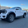 White ford ranger 2022+ with matte black sport smooth style fender flares and rugged off-road tires
