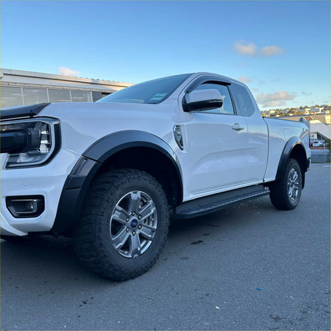 White ford ranger with matte black sport smooth style fender flares and silver alloy wheels 2022 plus model