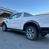 White ford ranger with matte black sport smooth style fender flares and silver alloy wheels for 2022+ models