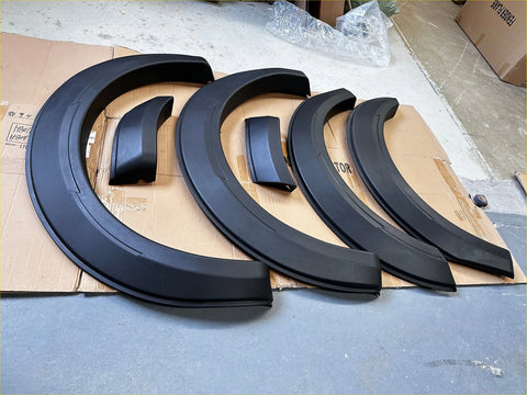 Black plastic matte black fender flares for gwm cannon 2019 plus smooth style shown from the back side