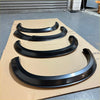 Black glossy fender flares for isuzu d-max 2016-2020 with 4-inch smooth style matte black finish on cardboard