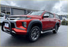 Red mitsubishi triton pickup with matte black smooth style fender flare, black guard, and side steps shown from the side