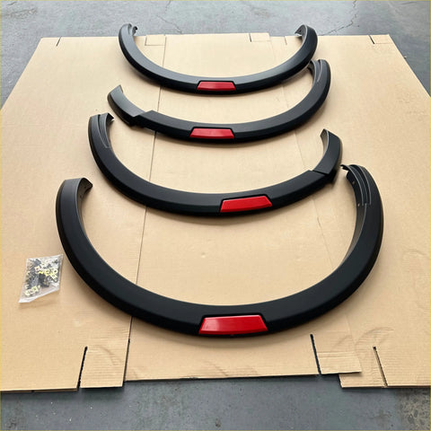 Black fender flares with red accent strips for nissan navara np300 2015-2020 oem style vehicle customization
