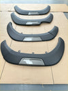 Black plastic fender flares with glossy finish and silver accents for toyota hilux 2015-2020 oem style with grey layer surface