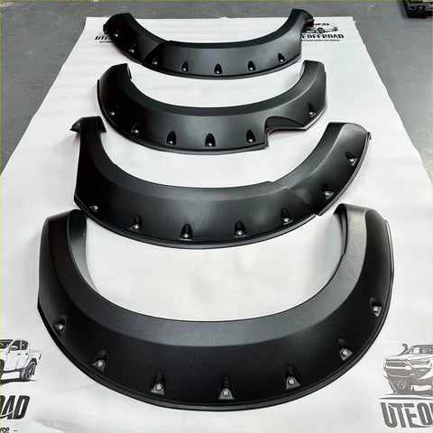 Black matte finish fender flares with rugged angular design and bolt style mounting holes for toyota hilux vigo 2005-2012