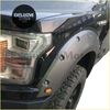 Black matte fender flares for ford f-150 2018-2023 with silver bolts and orange turn signal light