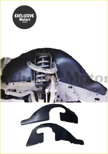 Black plastic fender lining and shock absorber cushion lining for toyota fj cruiser shown installed and as separate parts