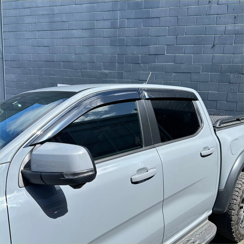 Clear transparent plastic window visors installed on white ford ranger 2022+ for weather shield door protection