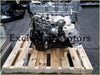 Ford Ranger WEAT engine silver and black automotive engine with metallic parts mounted on a wooden pallet