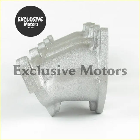 Silver metallic ford sierra cosworth manifold with textured cast metal and angular design for twin DHLA DCOE carbs