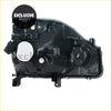 Black plastic front bumper headlight turn signal lamp with circular white lens and mounting points for nissan x-trail t31