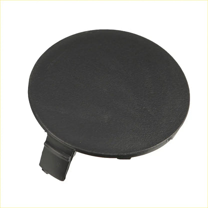 Black circular plastic fuel cap with a small tab for front bumper tow hook cover on toyota rav4 2019-2023