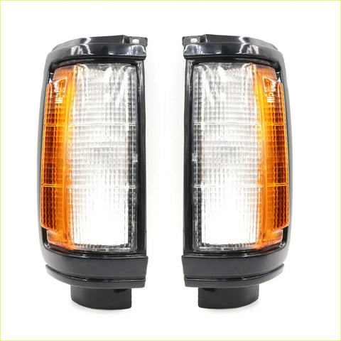 Front corner lightset for mitsubishi triton l200 1986-1996 featuring black plastic side markers with clear and amber lenses