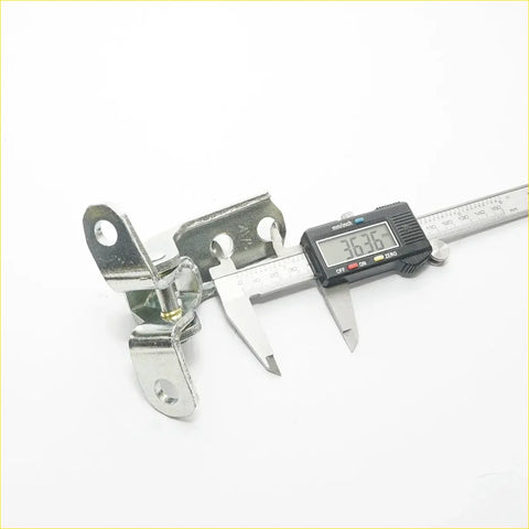 Silver metal front door hinge with shiny reflective surface and two circular mounting holes for mitsubishi triton l200