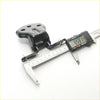 Black metal front door hinge for mazda b series b2000 b2600 1986-1993 being measured with digital caliper