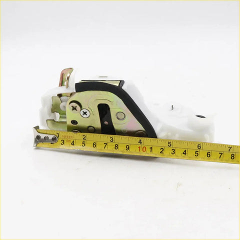 Metallic front door lock latch for toyota hilux 2011-2015 with black rubber seal and silver screws on white background