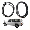Black rubber front door weatherstrip for white toyota land cruiser shown from the back side
