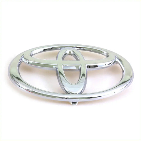 Chrome finished toyota front grill badge with sleek metallic finish and iconic three oval design for hilux mk6 sr5 2004-2012