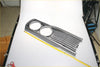 Front grill gray metallic trim with two circular cutouts and horizontal slats for toyota hilux 1972-1978