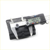 Black rubber front spring bumper lower for toyota hilux 1988-1997 being measured with digital caliper