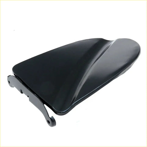 Black glossy plastic motorcycle seat with sleek curved design and mounting bracket for nissan navara king cab fuel door cover