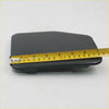 Black plastic fuel door cover lid with smooth matte finish and rounded edges for toyota hilux 1988-1997