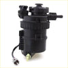 Black plastic fuel filter assembly with ribbed body and multiple connectors for Toyota Hilux SR5 2004-2016 back side view