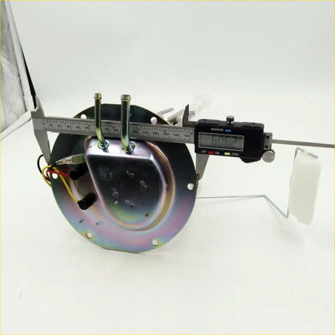 Shiny metallic fuel gauge sending unit for Nissan Datsun Navara with three rods and wires measured by digital caliper