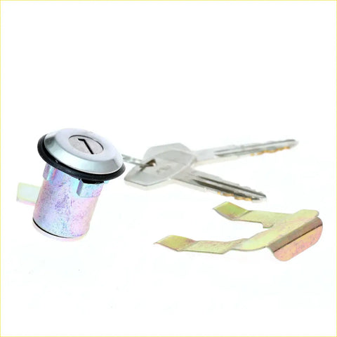 Silver cylindrical ignition lock cylinder with black rubber seal and matching keys for datsun nissan 620 fuel lid lock