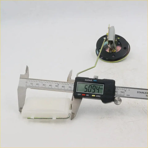 Digital caliper with black body and silver metallic jaws showing mm measurements for toyota hilux ute fuel sender gauge