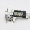 A shiny chrome fuel tank gas filler lock cylinder for toyota hilux 1983-1988 measured with digital caliper