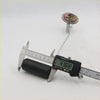 Black cylindrical roller with metallic attachment and digital caliper measuring 47.64 mm for nissan datsun ute 720 fuel tank gauge sending unit