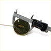 Fuel tank gauge sending unit for toyota hilux with brass circular part and central gold piece measured by digital caliper