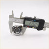 Shiny chrome gas filler lock push button for nissan d22 navara terrano 1997-2004 being measured with digital caliper