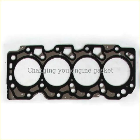 Black metal cylinder head gasket with four circular openings and textured surface for toyota carina corolla 1.8l