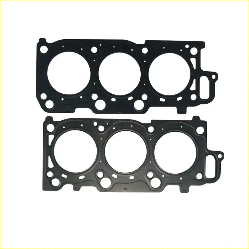 Black metal cylinder head gasket with three circular openings and bolt holes for 1MZFE toyota harrier lexus engine