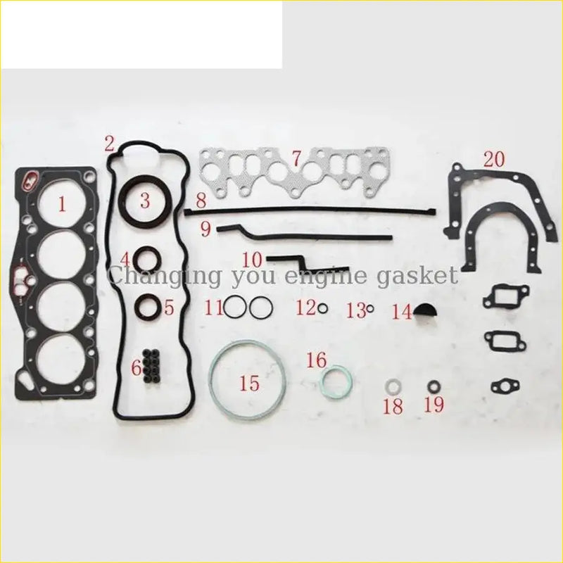 Black rubber and metal full gasket set with numbered parts for toyota corolla or tercel 1.3l 2au 2al engines
