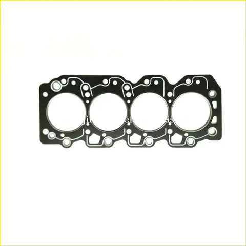 Black engine head gasket with four circular openings and small holes designed for toyota carina e corolla lite ace
