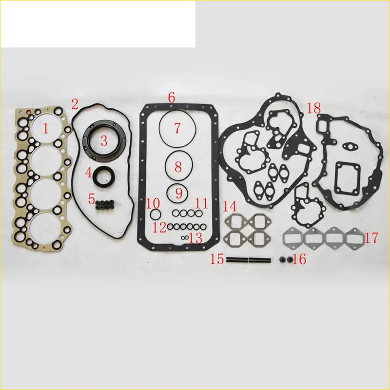 Black and beige engine gasket set with multiple shapes and circular cutouts for mitsubishi rosa canter fe325 3.7l full set