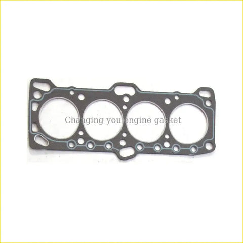 Black engine head gasket with four circular openings and textured surface for 4g62 mitsubishi tredia hyundai sonata ii 1.8 turbo