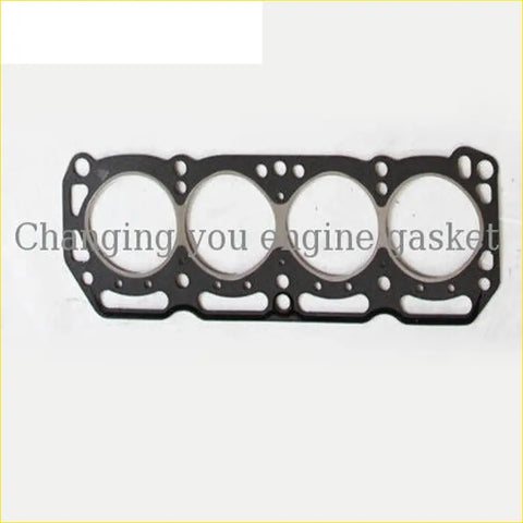 Black rubber engine head gasket with four circular openings and reinforced edge for nissan sunny cherry 1.2 cylinder head