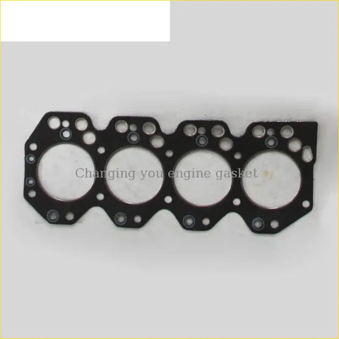 Black engine head gasket with four circular openings and bolt holes for toyota land cruiser coaster dyna 3.0 cylinder use