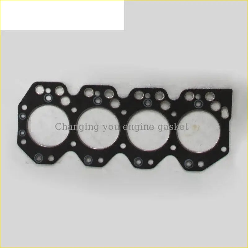 Black engine head gasket with four circular openings and bolt holes for toyota land cruiser coaster dyna 3.0 cylinder use