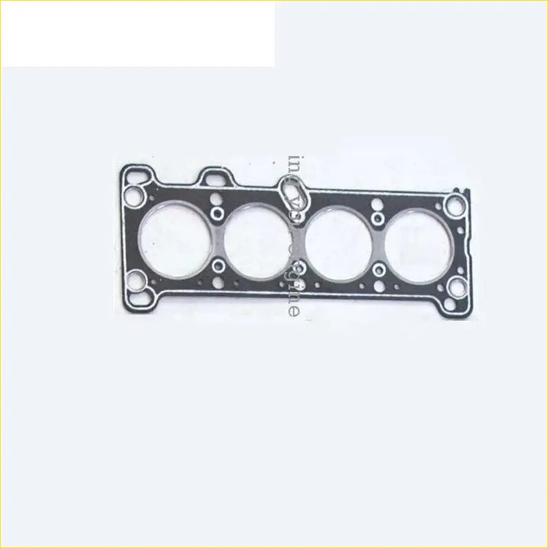 Black engine head gasket with four circular openings and metallic border for kia pride mazda 323 1.3L cylinder head