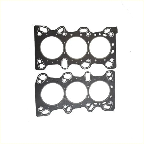 Black engine head gaskets with three circular openings and bolt holes for honda legend v6 24v sohc cylinder use